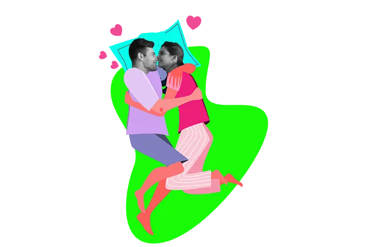 A couple cuddling in bed with hearts around their heads